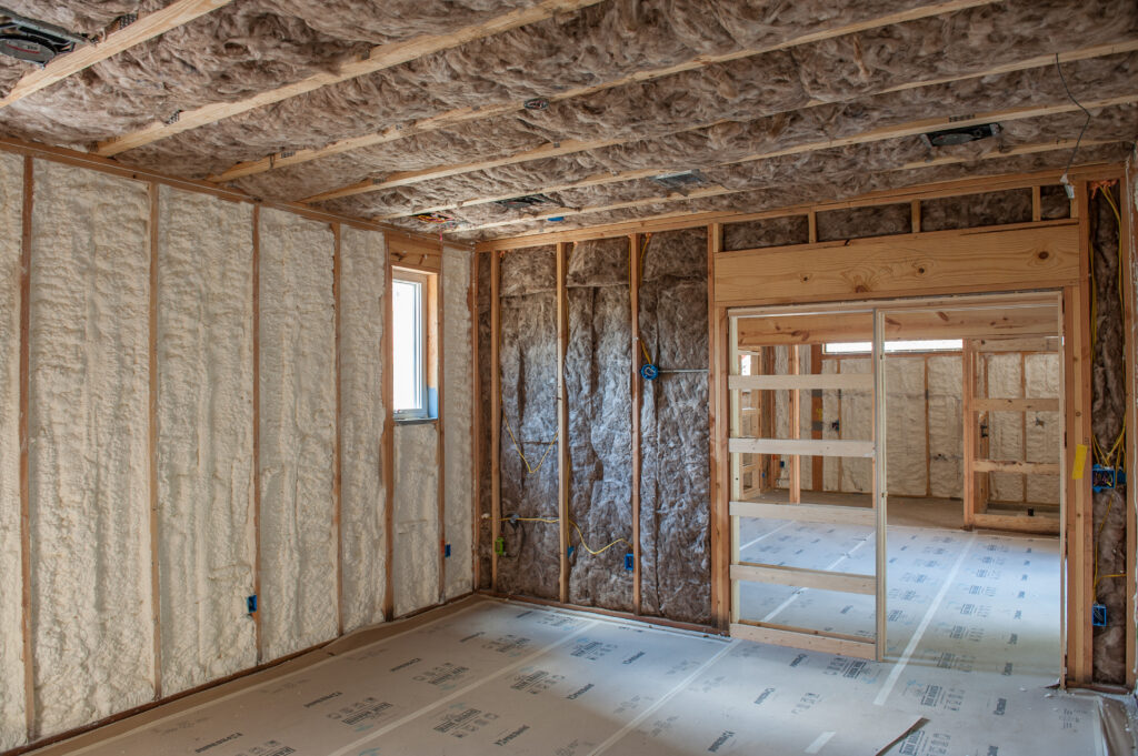 Spray foam and rockwool insulation installed in a wall