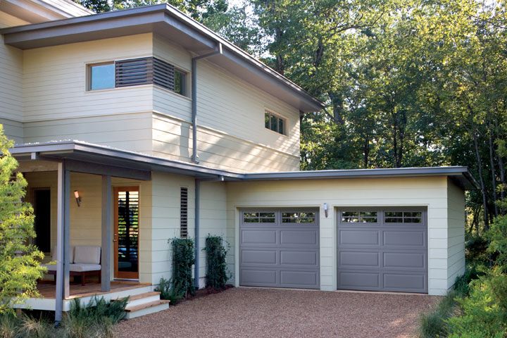 Two garage doors on large home